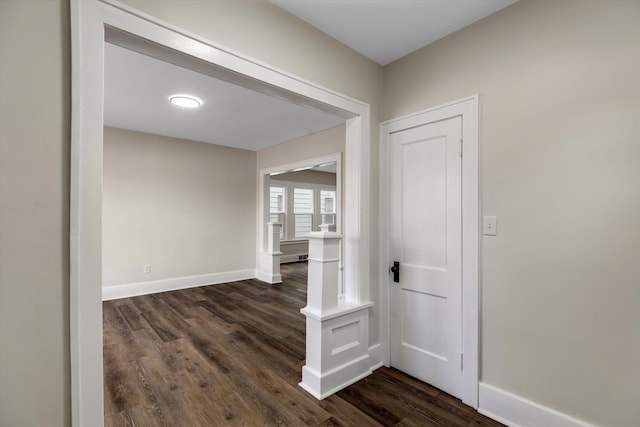 hallway featuring dark hardwood / wood-style floors