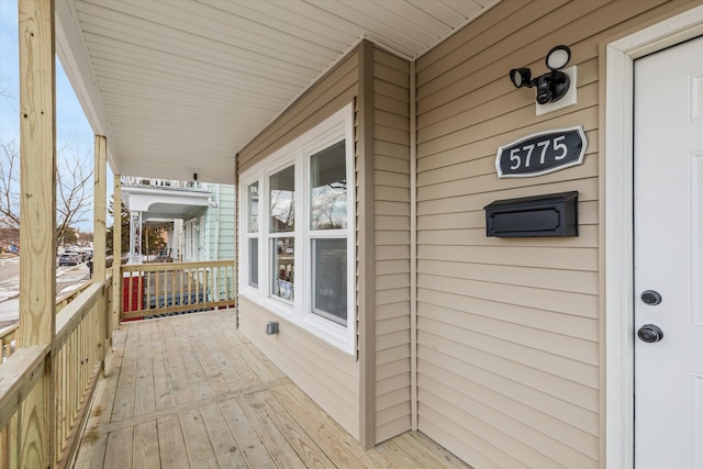 wooden deck with covered porch