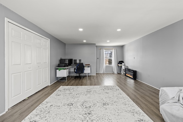 office with dark wood-type flooring