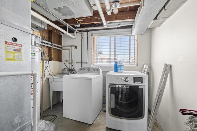 laundry room featuring independent washer and dryer