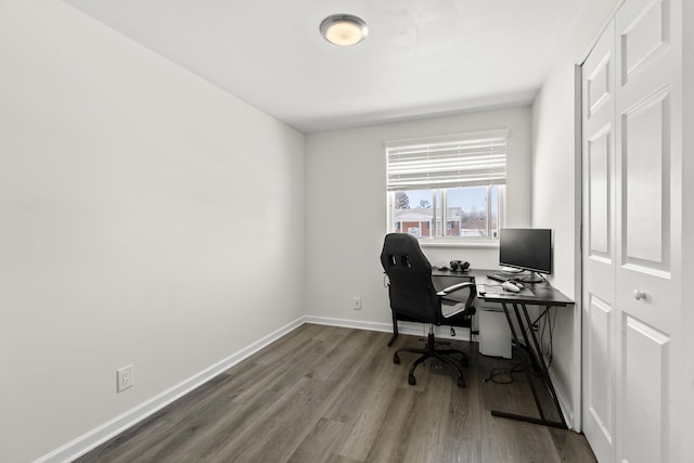 office space with wood-type flooring