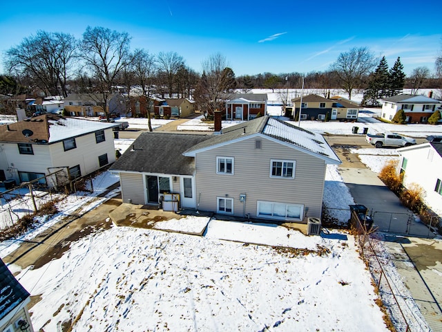 view of snow covered property