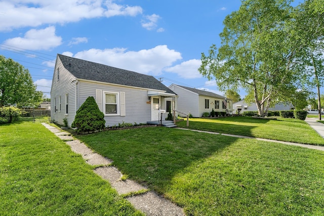 view of front of home featuring a front yard