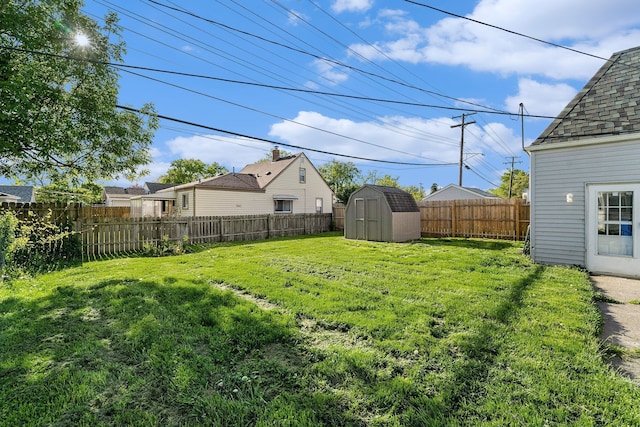 view of yard featuring a storage shed