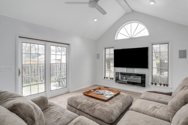 carpeted living room featuring beamed ceiling, high vaulted ceiling, and ceiling fan