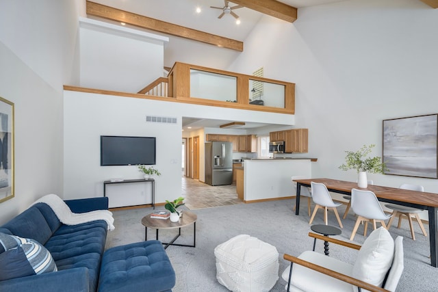 living room featuring light carpet, beam ceiling, and high vaulted ceiling