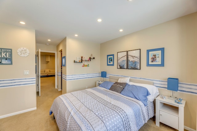 bedroom featuring light carpet