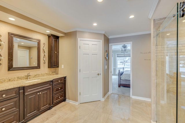 bathroom with walk in shower, ceiling fan, ornamental molding, and vanity