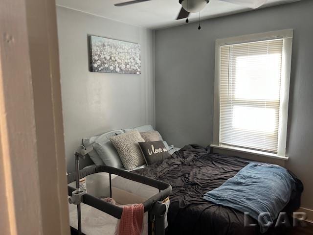 bedroom featuring ceiling fan