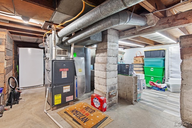 utility room with heating unit