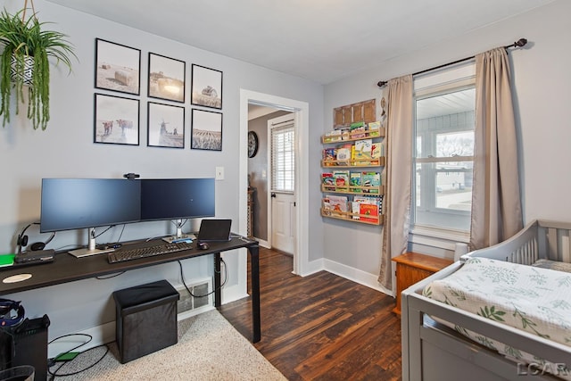 bedroom with dark hardwood / wood-style flooring