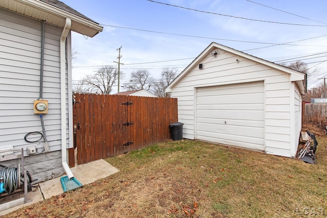 garage featuring a yard