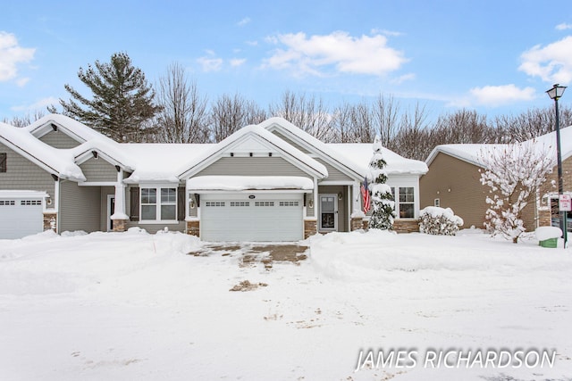 view of front of home with a garage