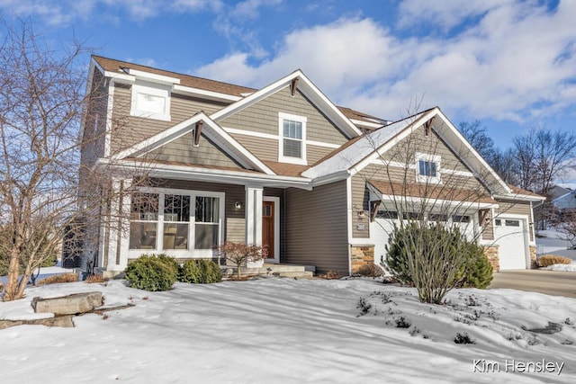 craftsman-style home featuring a garage