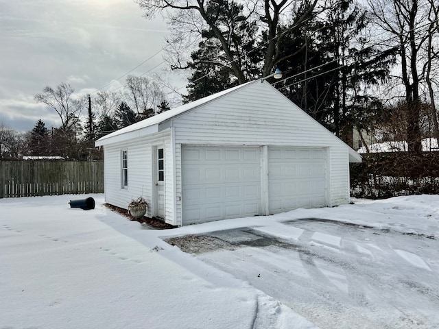 view of snow covered garage