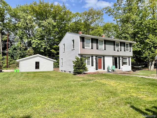 2855 20th Ave, Port Huron, MI 48060 - colonial inspired home with a chimney, a front yard, and view of scattered trees