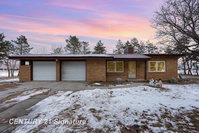 ranch-style house with a garage