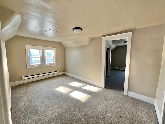 bonus room with light carpet, a baseboard radiator, and vaulted ceiling