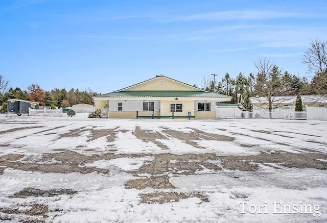 view of snow covered property