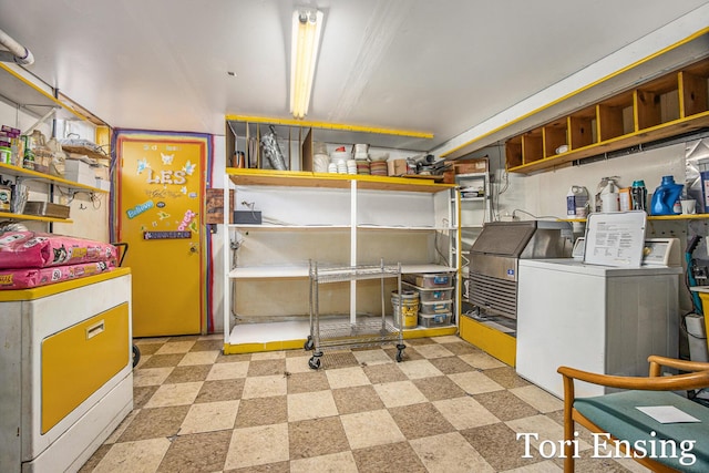 basement with washing machine and clothes dryer