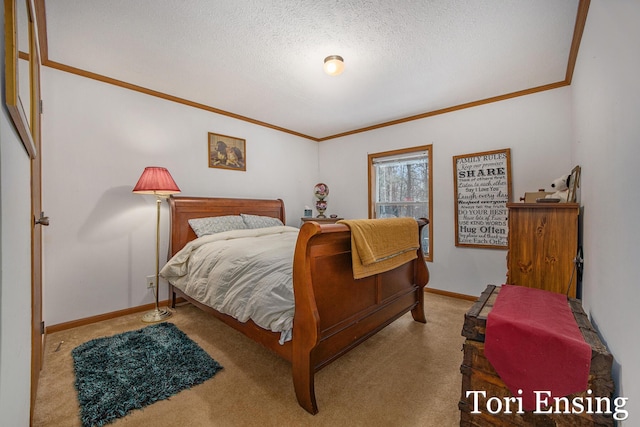 carpeted bedroom with ornamental molding and a textured ceiling