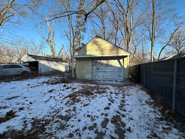 view of snow covered garage