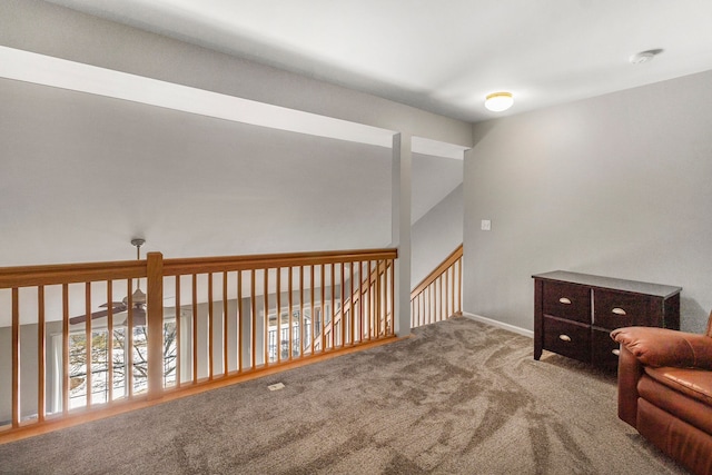 living area featuring light colored carpet