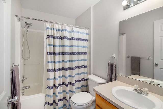 full bathroom featuring vanity, toilet, and shower / tub combo