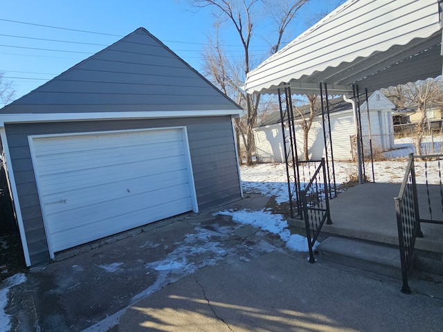 view of snow covered garage