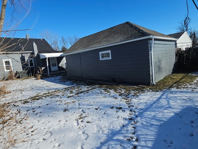 view of snow covered property