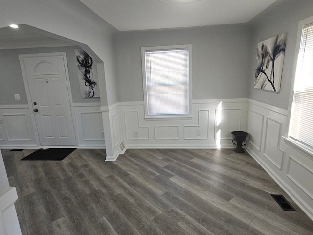 foyer entrance with dark hardwood / wood-style flooring