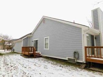 view of snow covered house