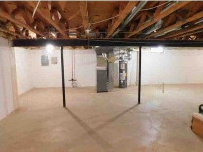 basement with heating unit and gas water heater