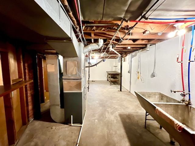 basement featuring heating unit