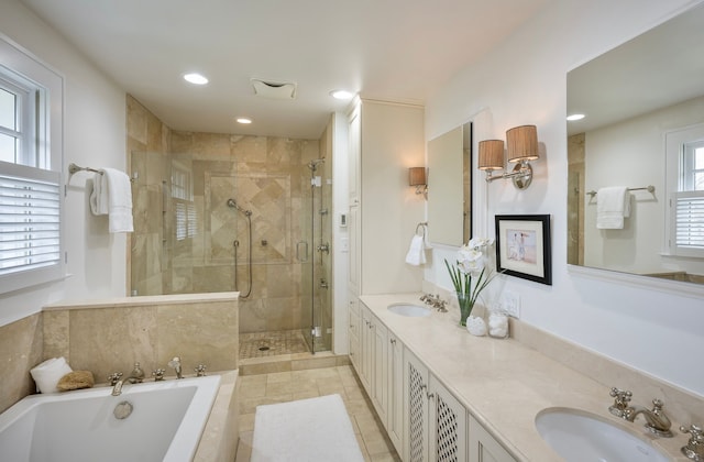 bathroom with vanity, tile patterned flooring, and separate shower and tub