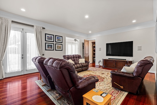 living room with ornamental molding, dark hardwood / wood-style floors, and french doors