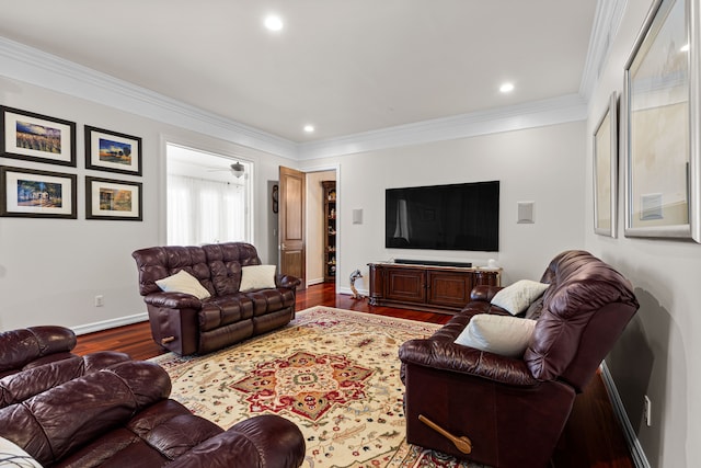 living room with crown molding and wood-type flooring