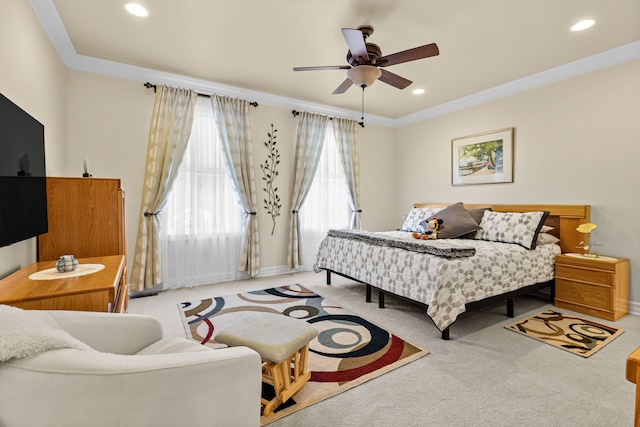 bedroom with light carpet, ornamental molding, and ceiling fan