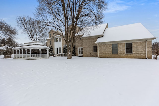 view of snow covered property