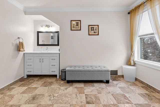 bathroom featuring vanity and crown molding