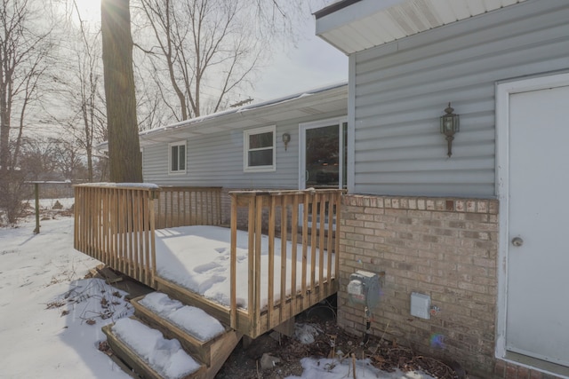 view of snow covered deck