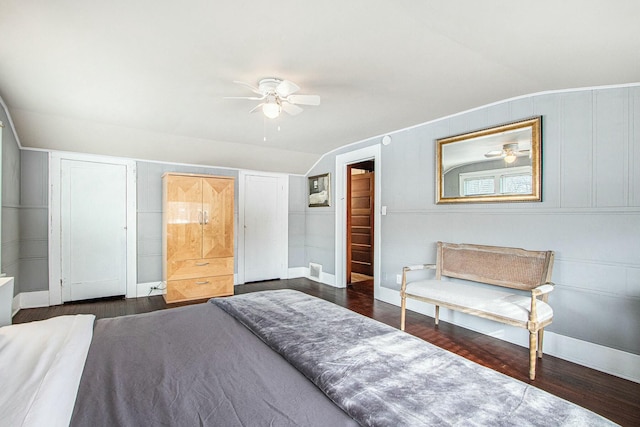 bedroom featuring vaulted ceiling, ceiling fan, and dark hardwood / wood-style flooring