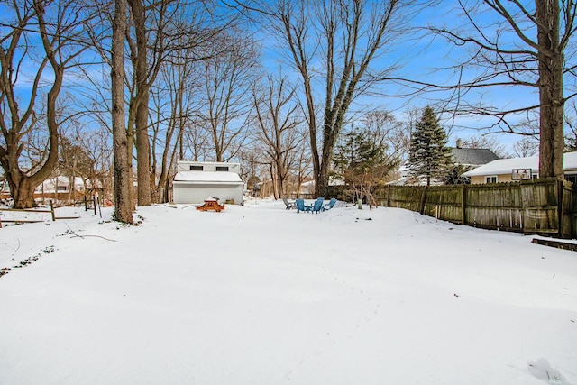 view of yard covered in snow