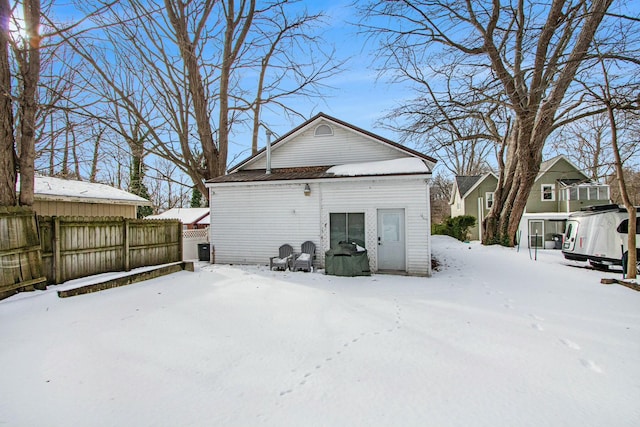 view of snow covered garage