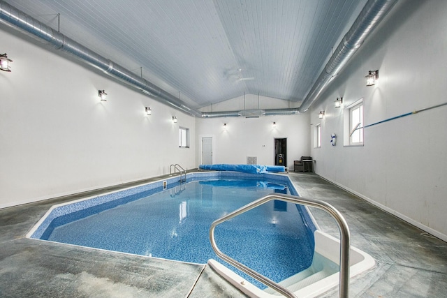 view of pool featuring a jacuzzi