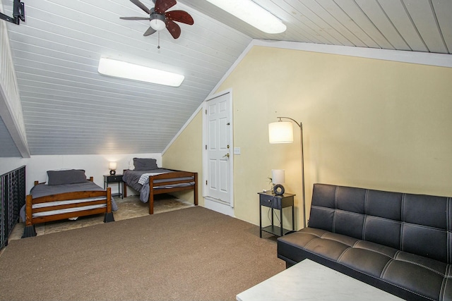 sitting room with lofted ceiling, wood ceiling, carpet floors, and ceiling fan