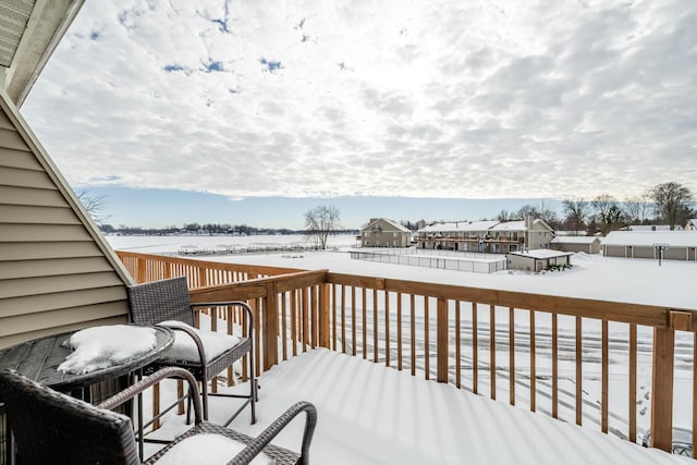 view of snow covered deck