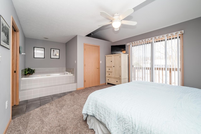 tiled bedroom with carpet flooring and ceiling fan