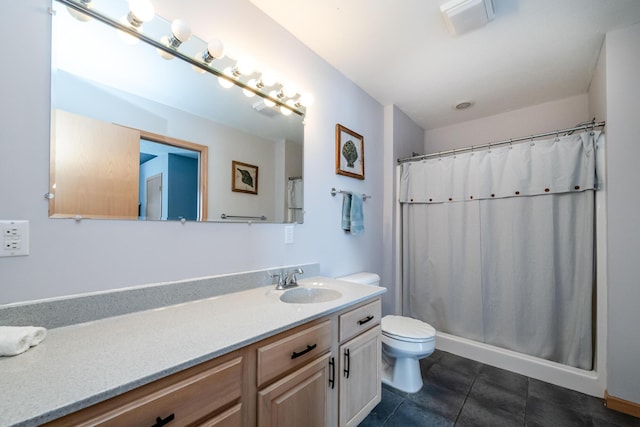 full bath with vanity, tile patterned floors, toilet, and a shower with curtain