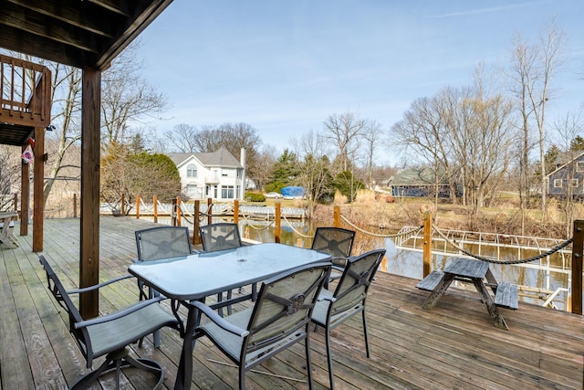 deck with outdoor dining area